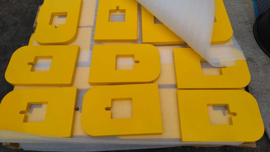 yellow powder coated pieces
